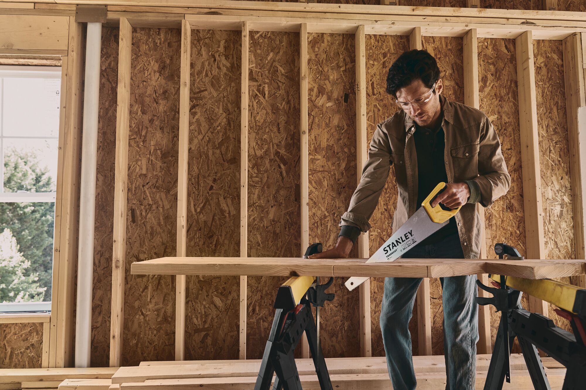 20 inch TRADE CUT Panel Saw being used for cutting wood.